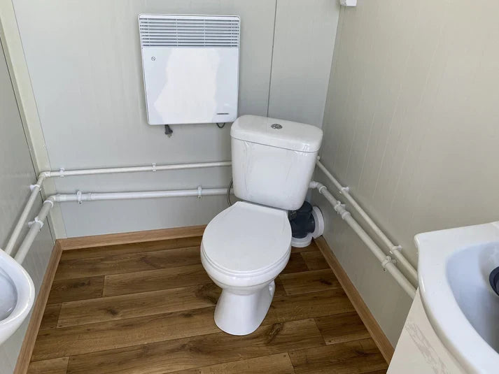 Double conteneur sanitaire avec dépôt de déchets.